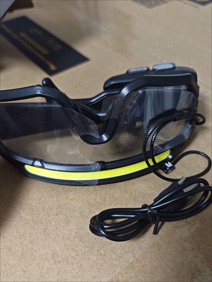 Unedited phone photo of Iron Beam goggles: single strip, unboxed